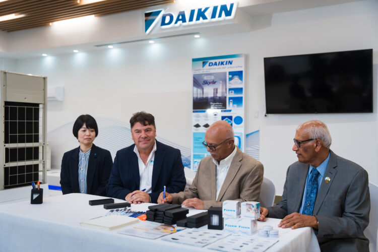 left to right are Daikin Representatives Ms. Yuko Yoshino and Mr. Gustavo Perez, and for Banks Automotive and Services Inc., Mr. Clifford Reis; Chairman of Banks Automotive Services Inc., and Mr. Shabir Hussein, Director of Banks Automotive and Services Inc.