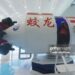 Visitors are using VR technology to experience deep-sea exploration in the ''Jiaolong Manned Submersible'' at the 2023 Zhejiang International Intelligent Transportation Industry Expo in Hangzhou, Zhejiang Province, China, on December 1, 2023. (Photo by Costfoto/NurPhoto via Getty Images)