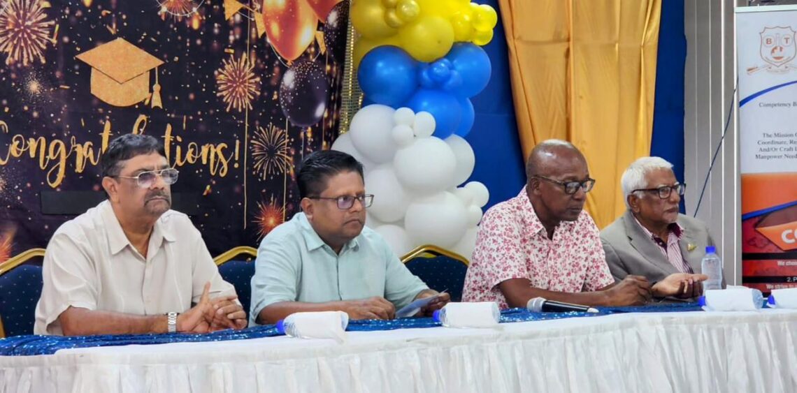 The head table at the HDEO graduation. Finance Minister Dr. Ashni Singh, second from left and Labour Minister Joe Hamilton second from right
