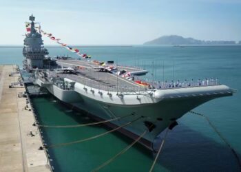 File photo taken on December 17, 2019 shows the Shandong aircraft carrier at a naval port in Sanya, south China's Hainan Province. China's first domestically built aircraft carrier, the Shandong, was delivered to the People's Liberation Army (PLA) Navy and placed in active service on December 17 at a naval port in Sanya. The new aircraft carrier, named after Shandong Province in east China, was given the hull number 17 (XINHUA)