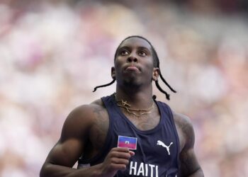 Ashley Landis / AP
Christopher Borzor, of Haiti, reacts after qualifying in a men’s 100 meters preliminary round heat at the 2024 Summer Olympics, Saturday, Aug. 3, 2024, in Saint-Denis, France.