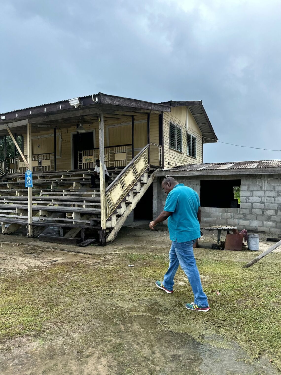 Regional Chairman Deron Adams drawing attention to a sports field and pavilion allowed by PPP government o fall in disrepair