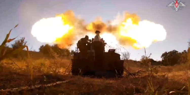 In this photo taken from video released by the Russian Defense Ministry on Sunday, Aug. 18, 2024, Russian soldiers fire Giatsint-S self-propelled gun towards Ukrainian positions at an undisclosed location in the Russian - Ukrainian border area in the Kursk region, Russia. (Russian Defense Ministry Press Service photo via AP)