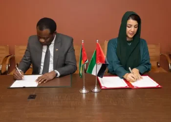 Minister of Foreign Affairs, Hugh Todd and Minister of State for International Cooperation of the UAE, Reem Al Hashimy sign the MoU for visa-free travel