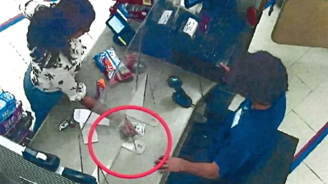 Security camera footage from Walgreen's shows Masserone completing a wire transfer at a Western Union kiosk. In the footage, she hands a cashier 25 $100 bills, totaling $2,500, according to the complaint. (Yahoo! news photo)