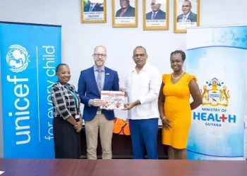 Honourable Minister of Health Dr Frank Anthony, Deputy Representative (ag), Mr Gabriel Vockel and other members receiving the donation