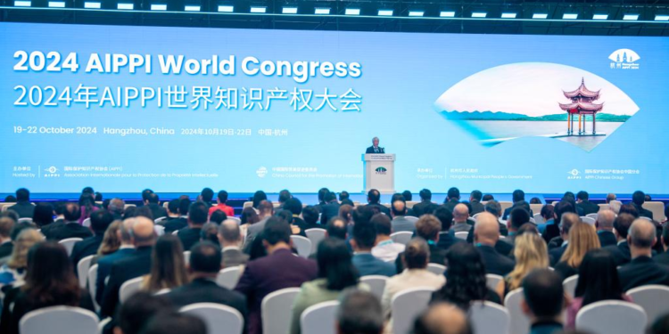 Chinese Vice Premier Zhang Guoqing, also a member of the Political Bureau of the Communist Party of China Central Committee, reads out President Xi Jinping's congratulatory letter to the 2024 International Association for the Protection of Intellectual Property (AIPPI) World Congress and delivers a speech during the opening ceremony of the congress in Hangzhou, east China's Zhejiang Province, Oct. 20, 2024. (Xinhua/Jiang Han)