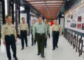Chinese President Xi Jinping, also general secretary of the Communist Party of China Central Committee and chairman of the Central Military Commission, learns about the history of a brigade, on Oct. 17, 2024. Xi inspected a brigade of the Chinese People's Liberation Army Rocket Force on Thursday. (Xinhua/Li Gang)