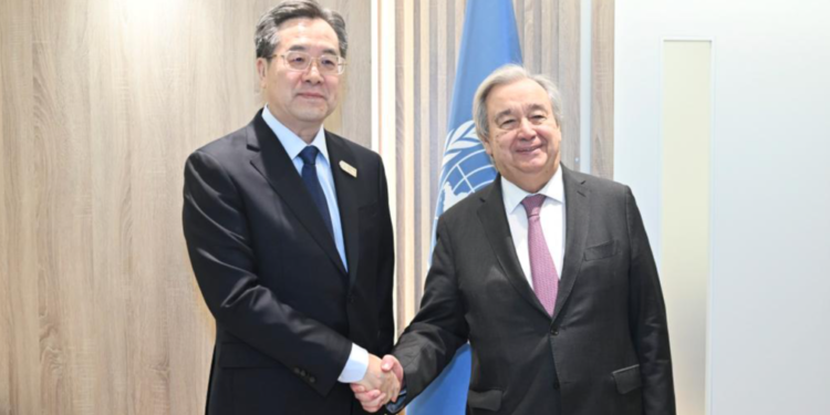 Chinese President Xi Jinping's Special Representative Ding Xuexiang, also a member of the Standing Committee of the Political Bureau of the Communist Party of China Central Committee and Chinese vice premier, meets with United Nations Secretary-General Antonio Guterres on the sidelines of the World Leaders Climate Action Summit during the 29th session of the Conference of the Parties to the United Nations Framework Convention on Climate Change in Baku, Azerbaijan, November 13, 2024. /Xinhua
