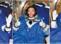 Shenzhou XVIII mission commander Senior Colonel Ye Guangfu (left) and crew members Lieutenant Colonel Li Cong (middle) and Lieutenant Colonel Li Guangsu wave and cheer during a live program early Monday morning soon after the spaceship's reentry capsule touched down at the Dongfeng Landing Site in the Inner Mongolia autonomous region. WANG JIANGBO/FOR CHINA DAILY