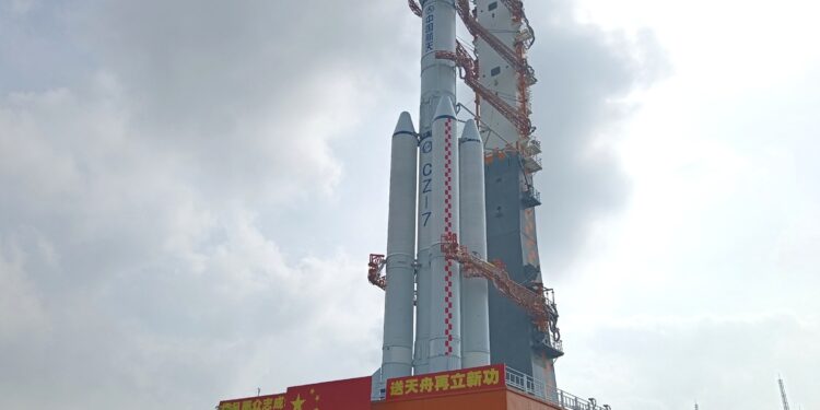 This photo taken on Nov 13, 2024 shows the combination of the Tianzhou-8 cargo spacecraft and a Long March-7 Y9 carrier rocket being vertically transferred to the launch area. [Photo/Xinhua]