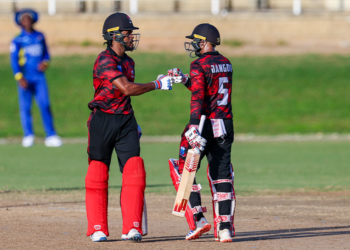 Trinidad & Tobago RedForce's Kjorn Ottley and Amir Jangoo meet in the middle