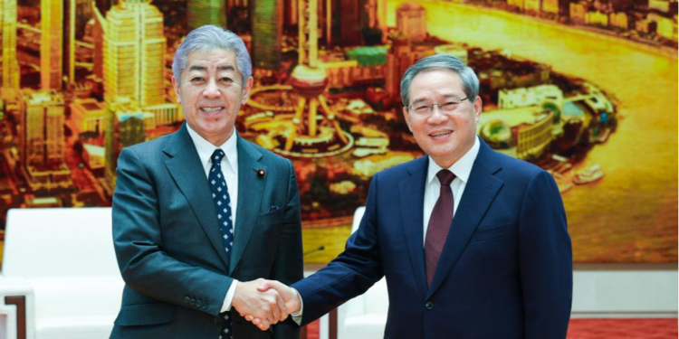 Chinese Premier Li Qiang (R) meets with Japanese Foreign Minister Takeshi Iwaya at the Great Hall of the People in Beijing, China, December 25, 2024. /Xinhua