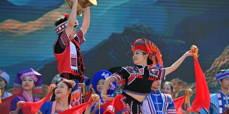 (241112) -- WUZHOU, Nov. 12, 2024 (Xinhua) -- People perform folk songs and dances during a cultural tourism carnival in Wuzhou, south China's Guangxi Zhuang Autonomous Region, Nov. 12, 2024. The 2024 Guangxi cultural tourism carnival kicked off here Tuesday. (Xinhua/Huang Xiaobang)