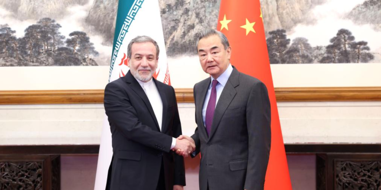 Chinese Foreign Minister Wang Yi, also a member of the Political Bureau of the Communist Party of China Central Committee, holds talks with Iranian Foreign Minister Seyyed Abbas Araghchi in Beijing, capital of China, Dec. 28, 2024. (Xinhua/Pang Xinglei)