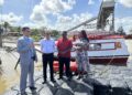 From Left (Mr. Abdul Saleh, Operations Manager at UNICEF Guyana & Suriname, Dr. Vishwa Mahadeo, Director General, Ministry of Health, Mr. Michael Gouveia, Coordinator of the Indigenous Peoples Communities, Dr. Oneka Scott, Maternal and Child Health Officer pose infront of the vaccine boats