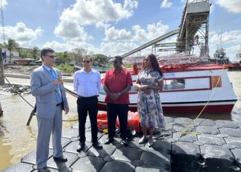 From Left (Mr. Abdul Saleh, Operations Manager at UNICEF Guyana & Suriname, Dr. Vishwa Mahadeo, Director General, Ministry of Health, Mr. Michael Gouveia, Coordinator of the Indigenous Peoples Communities, Dr. Oneka Scott, Maternal and Child Health Officer pose infront of the vaccine boats