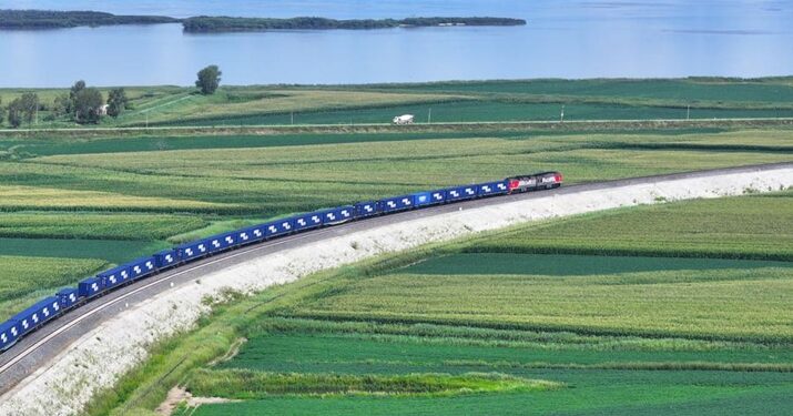 An aerial drone photo shows a train for China-Europe freight service pulling out of Tongjiang North Railway Port in northeast China's Heilongjiang Province, on August 9, 2024 (XINHUA)