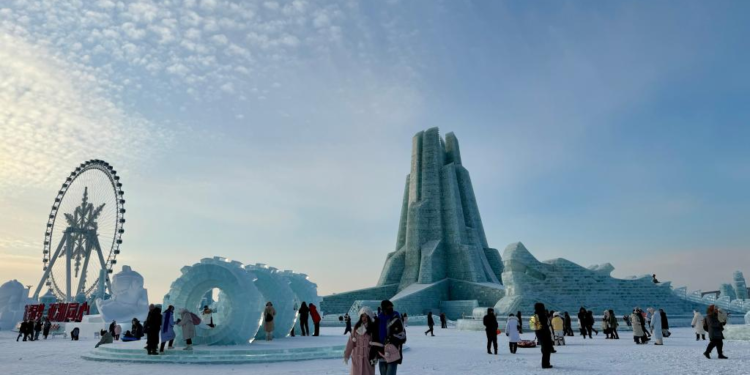 Tourists visit the Harbin Ice-Snow World, the world's largest ice-and-snow theme park, in Harbin, the capital city of northeast China's Heilongjiang Province, Dec. 21, 2024. (Xinhua/Yang Siqi)