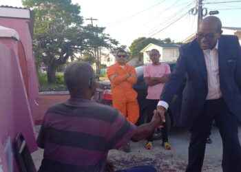 AFC Leader Nigel Hughes interacting with the resident from North/South Ruimveldt areas affected by the power outages (Photo credit: Nigel Hughes' facebook)