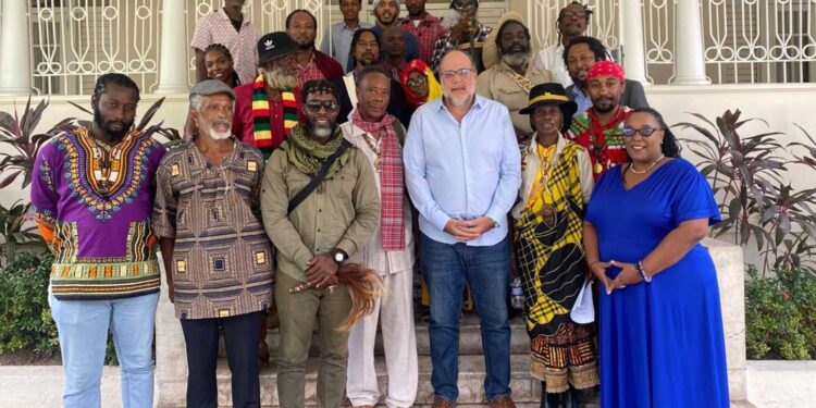 PNP President Mark Golding and Culture Spokesperson, Dr. Debora Hickling meets with members of the island Maroon and Tiano communities.