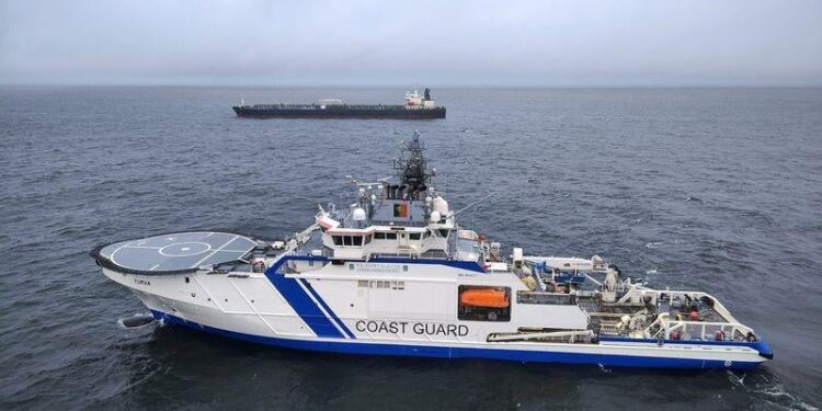 FILE PHOTO: Finnish Border Guard's ship Turva and oil tanker Eagle S sail on the sea outside the Porkkalanniemi, Finland on December 26, 2024. RAJAVARTIOSTO-Finnish Border Guard/LEHTIKUVA/HANDOUT via REUTERS/File Photo. Rajavartiosto // Finnish Border