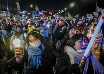 Protesters celebrate the impeachment of South Korean president Yoon Suk Yeol following his decision to impose a martial law, in front of National Assembly on Dec.14, 2024, in Seoul, South Korea.Woohae Cho / Getty Images