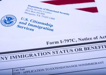 An official USCIS envelope next to Form I-797C (Notice of action, immigration status) and a U.S. flag. The U.S. Supreme Court ruled on Tuesday that federal courts do not have the authority to review certain discretionary decisions made by immigration agencies. Less Getty Images