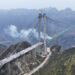 This photo shows a view of the Huajiang Grand Canyon Bridge in Southwest China's Guizhou province, Jan 17, 2025. [Photo by Liu Yelin/for chinadaily.com.cn]