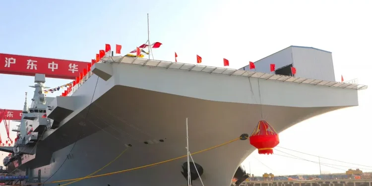In this photo released by Xinhua News Agency, China's first Type 076 new-generation amphibious assault ship, the Sichuan, is seen in Shanghai, December 27, 2024. - Photo: Li Yun / Xinhua