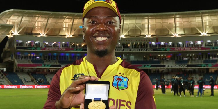 Sherfane Rutherford shows off a Player of the Match award. (Photo: Skysports)