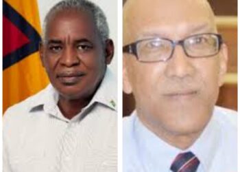 L-R Minister Robeson Benn and GHK Lall