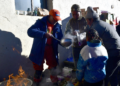 Fire brigade staff prepare breakfast for people in Cuoguo Town, Dingri County, southwest China's Xizang Autonomous Region, January 8, 2025. /CFP
