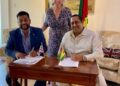 L – R: BritCham Chairman Faizal Khan and Iwokrama CEO, Dane Gobin along with British High Commissioner to Guyana, Amb Jane Miller at the signing ceremony.