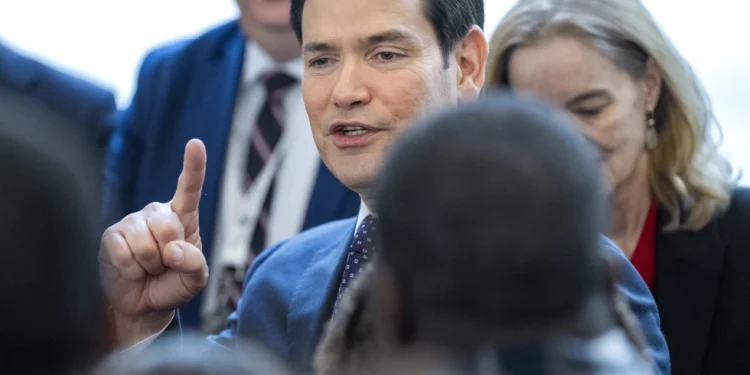 Secretary of State Marco Rubio greets State Department staff during a welcome event at the State Department, Tuesday, Jan. 21, 2025, in Washington. (AP Photo/Jacquelyn Martin)