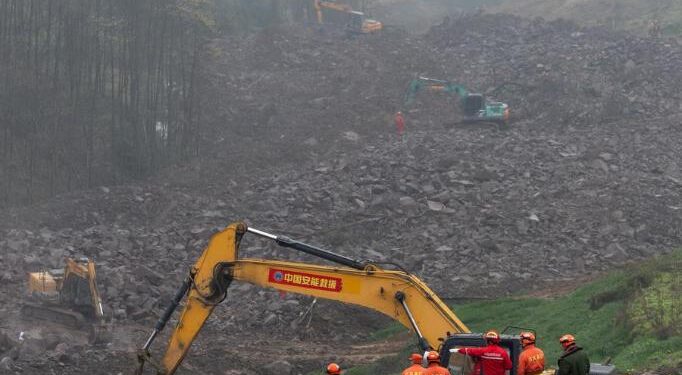 Rescuers search for missing people at the site of a landslide in Junlian County in the city of Yibin, southwest China's Sichuan Province, Feb. 9, 2025. (Xinhua/Jiang Hongjing)