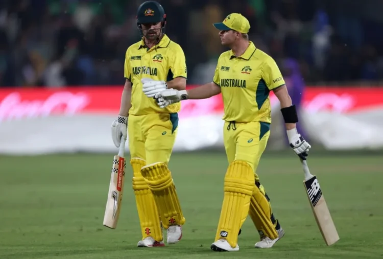 Travis Head and Steven Smith put on 65 before having to go off for rain•ICC/Getty Images