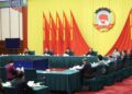 Wang Huning, a member of the Standing Committee of the Political Bureau of the Communist Party of China Central Committee and chairman of the National Committee of the Chinese People's Political Consultative Conference (CPPCC), presides over the 31st Chairperson's Council meeting of the 14th CPPCC National Committee and delivers a speech in Beijing, capital of China, Feb. 26, 2025. (Xinhua/Ding Lin)