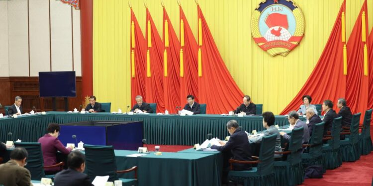 Wang Huning, a member of the Standing Committee of the Political Bureau of the Communist Party of China Central Committee and chairman of the National Committee of the Chinese People's Political Consultative Conference (CPPCC), presides over the 31st Chairperson's Council meeting of the 14th CPPCC National Committee and delivers a speech in Beijing, capital of China, Feb. 26, 2025. (Xinhua/Ding Lin)