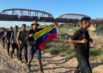 Venezuelans cross into the US from Mexico on Sunday. Photograph: Paula Ramon/AFP/Getty Images