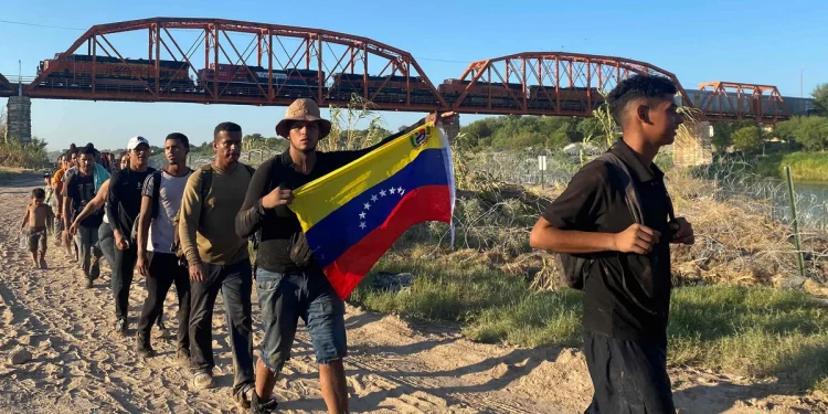 Venezuelans cross into the US from Mexico on Sunday. Photograph: Paula Ramon/AFP/Getty Images