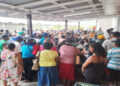 Pensioners crammed inside the Leonora NIS office compound waiting to hear their names called (Stabroek News photo)