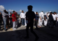 Guatemalan migrants deported from the United States arrive at La Aurora International Airport. Moises Castillo (AP)