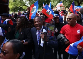 Members of the Haitian community and their allies at a rally against President Donald Trump’s rhetoric towards Haitian migrants in Ohio, in Boston, Mass., on Sep. 24, 2024.Jessica Rinaldi—The Boston Globe/Getty Images