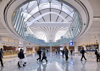 Foreign tourists go through customs at the Beijing Daxing International Airport in Beijing, capital of China, Dec. 27, 2024. (Xinhua/Ju Huanzong