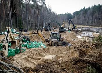 Military personnel search for missing U.S. soldiers at Pabrade training ground in Lithuania on Friday.Petras Malukas / AFP - Getty Images