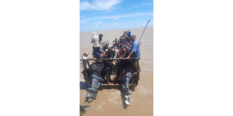 75 Venezuelan nationals intercepted off Guyana coast. Photo:Guyana Police Force