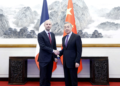 Chinese Minister of Foreign Affairs Wang Yi (R) shakes hands with French Minister for Europe and Foreign Affairs Jean-Noel Barrot in Beijing, China, March 27, 2025. /Chinese Foreign Ministry