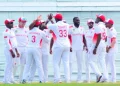 ON A ROLL: The T&T Red Force players celebrate one of two wickets for Anderson Phillip, centre, yesterday, second day of the West Indies Four-Day Championship fifth round match against the Barbados Pride at Kensington Oval, Bridgetown, Barbados.