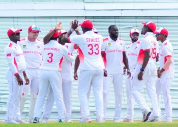 ON A ROLL: The T&T Red Force players celebrate one of two wickets for Anderson Phillip, centre, yesterday, second day of the West Indies Four-Day Championship fifth round match against the Barbados Pride at Kensington Oval, Bridgetown, Barbados.
